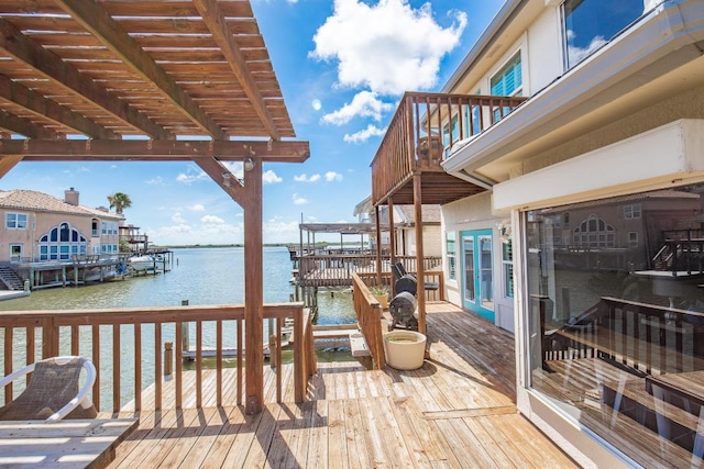 13517 Carlos Fifth Ct, Corpus Christi, TX 78418 - wooden terrace with a water view, boat lift, a pergola, and a dock