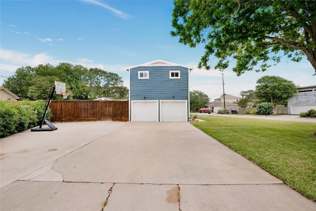 134 Sinclair St, Corpus Christi, TX 78411 - view of property exterior with a garage and concrete driveway