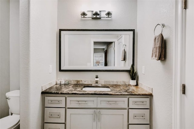 134 Sinclair St, Corpus Christi, TX 78411 - bathroom featuring vanity and toilet