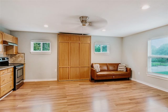 134 Sinclair St, Corpus Christi, TX 78411 - sitting room with healthy amount of natural light, light wood finished floors, recessed lighting, and ceiling fan