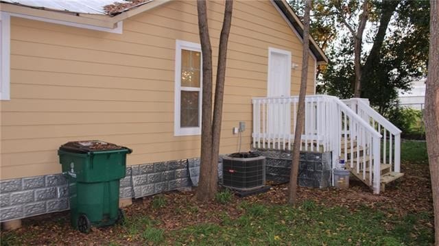 502 Toliver St, Bastrop, TX 78602 - view of property exterior featuring a cooling unit