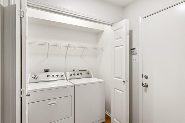 237 Baldwin St, Hutto, TX 78634 - laundry area with washing machine and clothes dryer