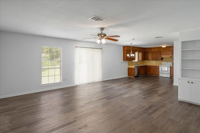 114 Pecan Dr, Elgin, TX 78621 - unfurnished living room with a ceiling fan, a chandelier, and dark wood-style floors