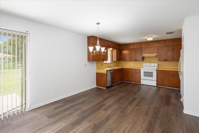 114 Pecan Dr, Elgin, TX 78621 - kitchen featuring white appliances, brown cabinets, a chandelier, under cabinet range hood, and light countertops