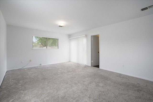 114 Pecan Dr, Elgin, TX 78621 - carpeted empty room with baseboards