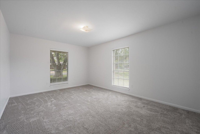 114 Pecan Dr, Elgin, TX 78621 - carpeted spare room with healthy amount of natural light