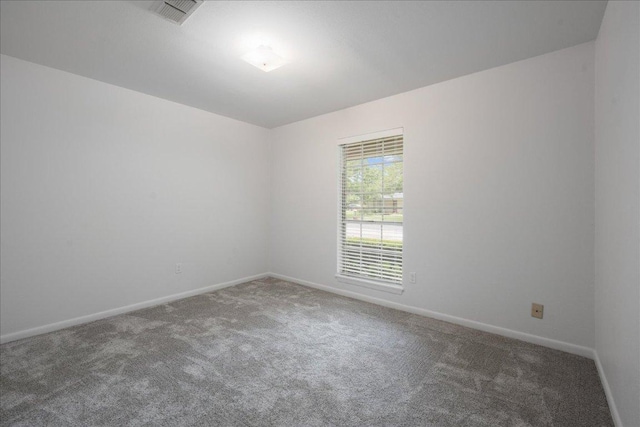 114 Pecan Dr, Elgin, TX 78621 - carpeted spare room with baseboards