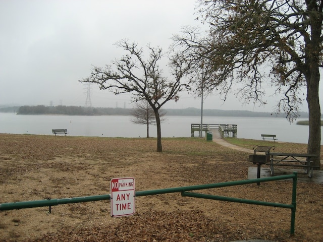 169 Pine Song, Bastrop, TX 78602 - view of home's community with a water view