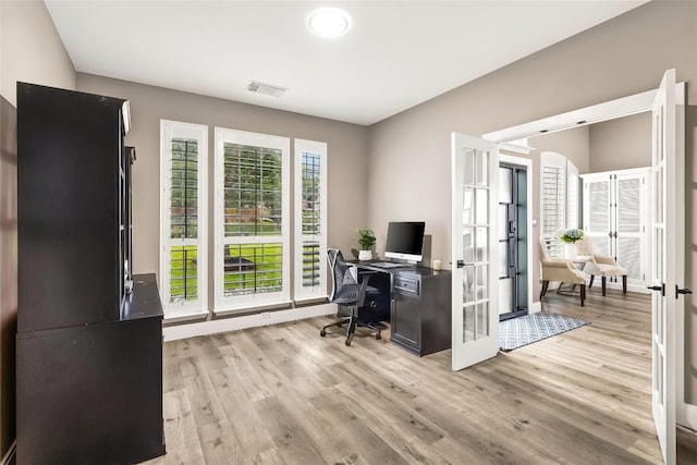 291 Torrington Dr, Austin, TX 78737 - office area with french doors and light wood finished floors