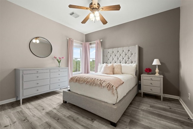 291 Torrington Dr, Austin, TX 78737 - bedroom featuring wood finished floors and a ceiling fan