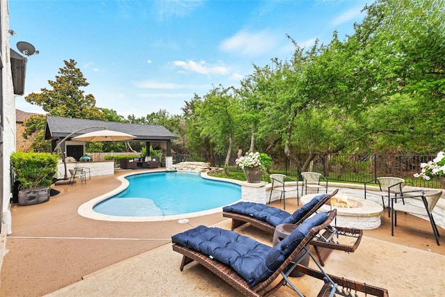 291 Torrington Dr, Austin, TX 78737 - view of swimming pool featuring an outdoor fire pit and a patio