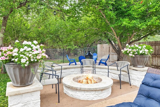 291 Torrington Dr, Austin, TX 78737 - fenced backyard with an outdoor fire pit and a patio