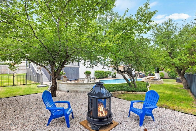 291 Torrington Dr, Austin, TX 78737 - fenced backyard featuring an outdoor fire pit and a patio