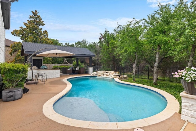 291 Torrington Dr, Austin, TX 78737 - view of swimming pool with a patio area, a grill, and an outdoor hangout area