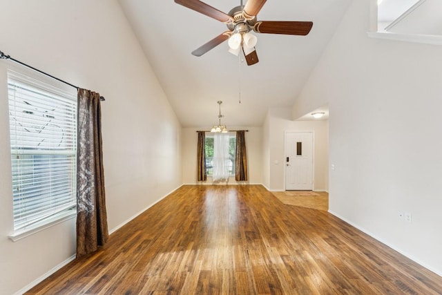 9004 Postvine Dr, Austin, TX 78724 - unfurnished living room featuring hardwood / wood-style flooring, high vaulted ceiling, and a ceiling fan
