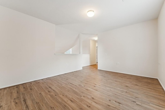 9004 Postvine Dr, Austin, TX 78724 - unfurnished room featuring wood finished floors and baseboards