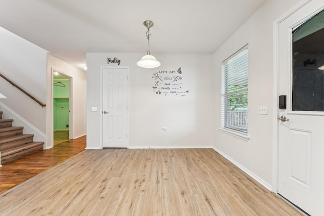 9004 Postvine Dr, Austin, TX 78724 - unfurnished dining area featuring light wood-style floors and stairway