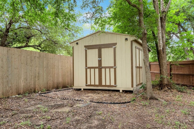 9004 Postvine Dr, Austin, TX 78724 - view of shed with a fenced backyard