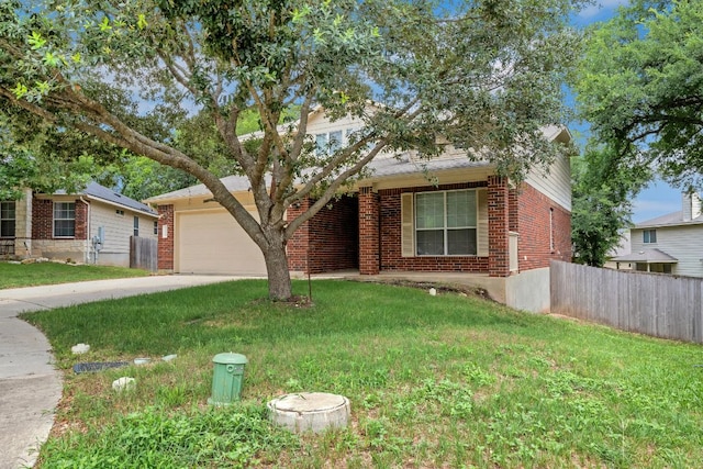 9004 Postvine Dr, Austin, TX 78724 - obstructed view of property featuring concrete driveway, a garage, and brick siding