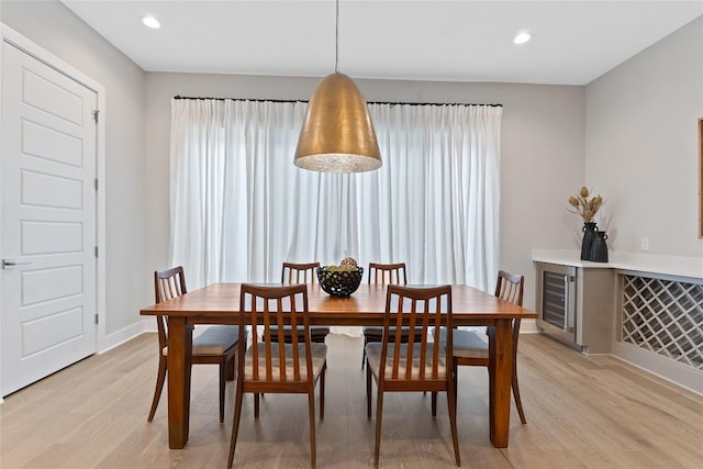 4510 Unity Cir Unit 258, Austin, TX 78731 - dining space featuring light wood-type flooring, wine cooler, and recessed lighting