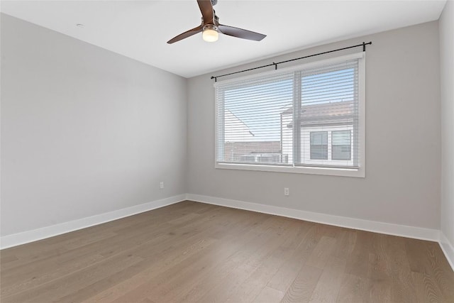 4510 Unity Cir Unit 258, Austin, TX 78731 - spare room with wood finished floors and a ceiling fan