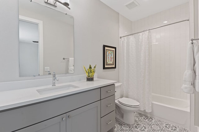 4510 Unity Cir Unit 258, Austin, TX 78731 - full bathroom featuring vanity, tile patterned floors, and shower / tub combo with curtain