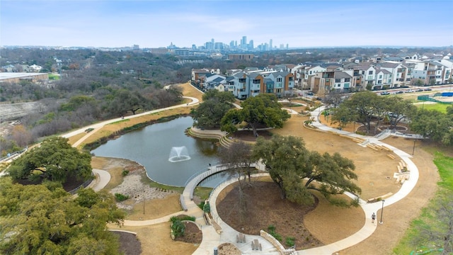 4510 Unity Cir Unit 258, Austin, TX 78731 - aerial overview of property's location featuring nearby suburban area, a nearby body of water, and city skyline