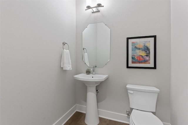 4510 Unity Cir Unit 258, Austin, TX 78731 - bathroom featuring toilet and wood finished floors