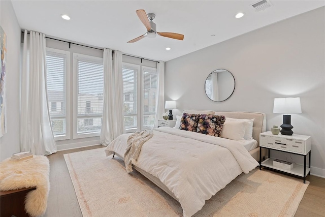 4510 Unity Cir Unit 258, Austin, TX 78731 - bedroom featuring light wood-style floors, recessed lighting, and ceiling fan