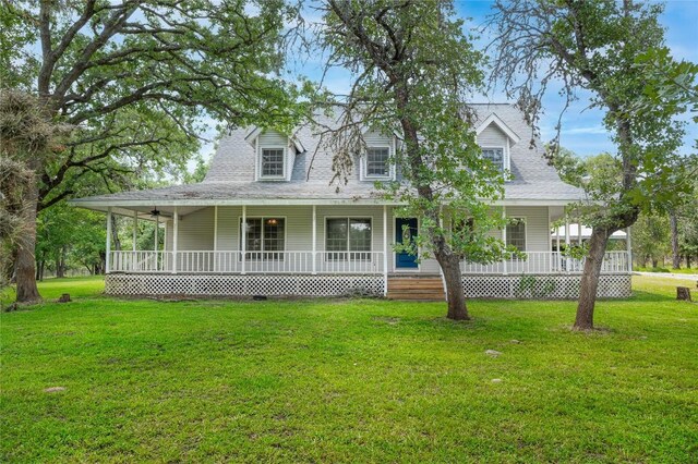 2981 Vivroux Ranch Rd, Seguin, TX 78155 - farmhouse-style home featuring a porch and a front yard