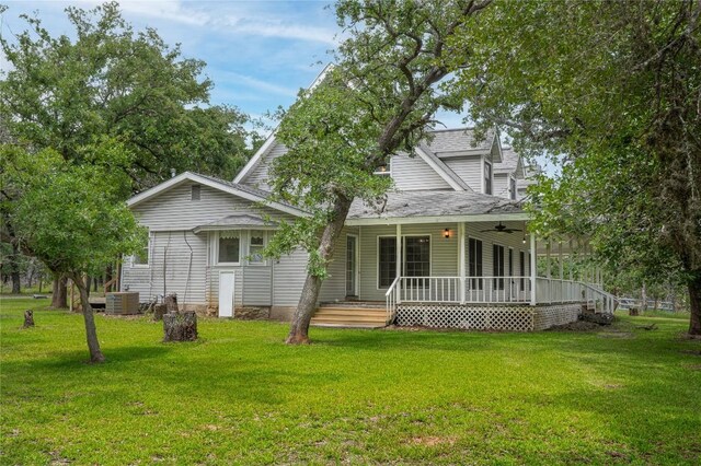 2981 Vivroux Ranch Rd, Seguin, TX 78155 - view of front facade with covered porch, a front yard, and ceiling fan