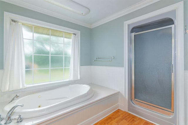 2981 Vivroux Ranch Rd, Seguin, TX 78155 - full bath featuring a shower stall, a whirlpool tub, wood finished floors, crown molding, and a wainscoted wall