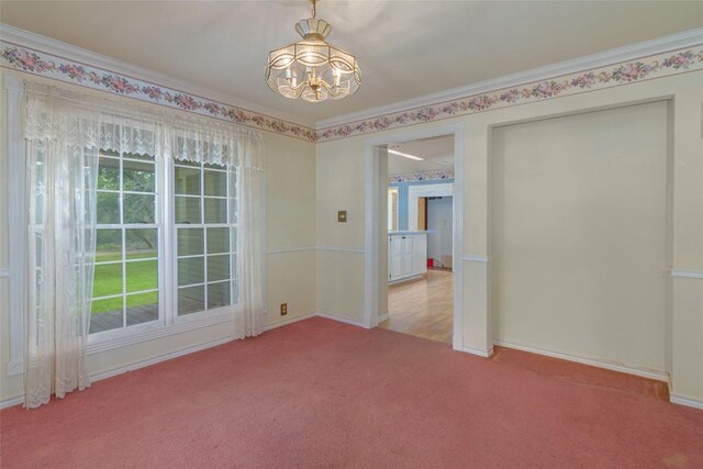 2981 Vivroux Ranch Rd, Seguin, TX 78155 - empty room with a chandelier, carpet flooring, and crown molding