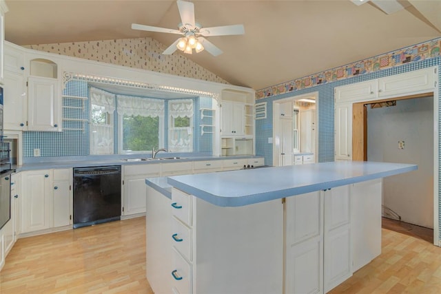 2981 Vivroux Ranch Rd, Seguin, TX 78155 - kitchen with dishwasher, vaulted ceiling, a center island, light wood-type flooring, and a ceiling fan
