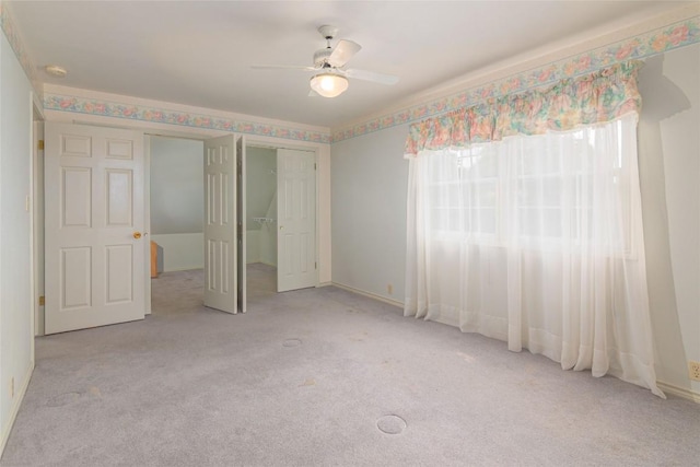 2981 Vivroux Ranch Rd, Seguin, TX 78155 - unfurnished bedroom featuring multiple windows, carpet floors, and ceiling fan