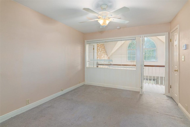 2981 Vivroux Ranch Rd, Seguin, TX 78155 - carpeted spare room with baseboards and a ceiling fan