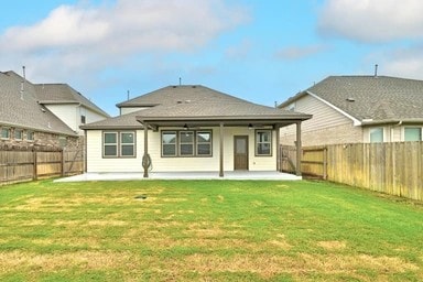 17320 Calipatria Ln, Pflugerville, TX 78660 - rear view of property featuring a patio area and a fenced backyard