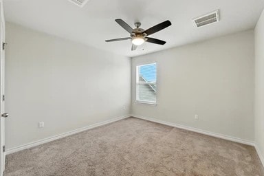 17320 Calipatria Ln, Pflugerville, TX 78660 - unfurnished room with carpet floors and a ceiling fan