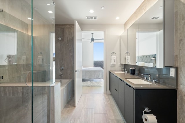 44 E Ave Unit 3801, Austin, TX 78701 - full bath featuring ensuite bathroom, double vanity, a shower with door, a bath, and recessed lighting