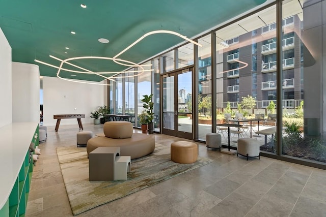 44 E Ave Unit 3801, Austin, TX 78701 - community lobby featuring expansive windows and a towering ceiling