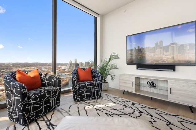 44 E Ave Unit 3801, Austin, TX 78701 - sitting room with wood finished floors and expansive windows