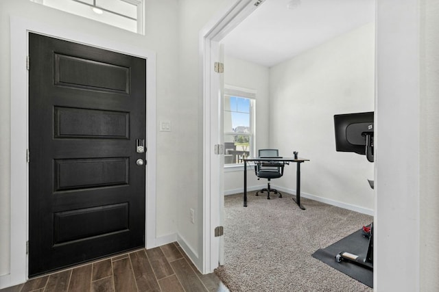 180 Yellowstone Dr, Kyle, TX 78640 - entryway featuring baseboards and dark wood-style floors