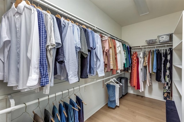 12816 Texas Sage Ct, Austin, TX 78732 - spacious closet featuring wood finished floors