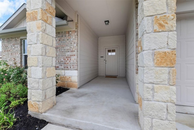 118 Craft St, Hutto, TX 78634 - doorway to property with stone siding and brick siding