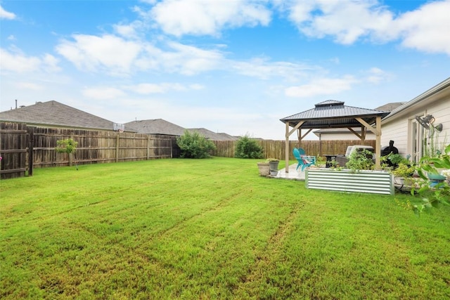 118 Craft St, Hutto, TX 78634 - fenced backyard featuring a gazebo and a patio area