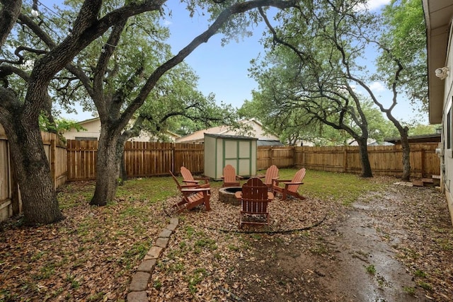 8406 Copano Dr, Austin, TX 78749 - fenced backyard featuring a storage shed and a fire pit