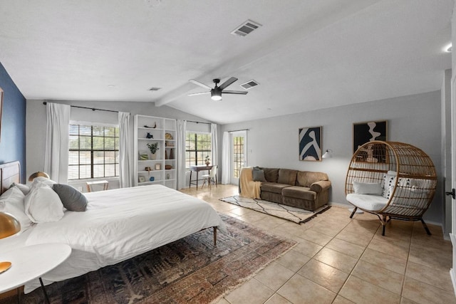 8406 Copano Dr, Austin, TX 78749 - bedroom featuring vaulted ceiling, light tile patterned floors, and ceiling fan