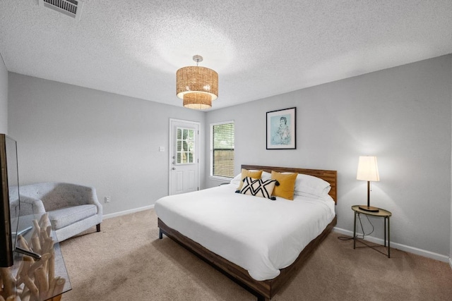 8406 Copano Dr, Austin, TX 78749 - bedroom featuring carpet and a textured ceiling