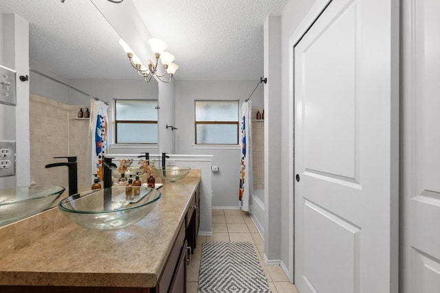 8406 Copano Dr, Austin, TX 78749 - full bath featuring a textured ceiling, double vanity, shower / bathtub combination with curtain, tile patterned flooring, and a chandelier