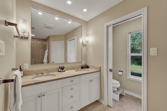 830 Palomino Ln, San Marcos, TX 78666 - full bath featuring double vanity, tiled shower, and recessed lighting